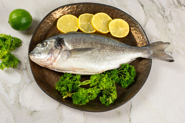 sea bream fish with lemon slices