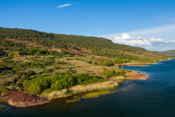 Lake Salagou in Europe, France, Occitanie, Herault, Clermont l Herault, in summer, on a sunny day.