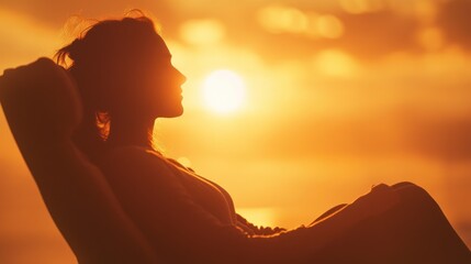 Woman Silhouetted Against a Sunset Sky
