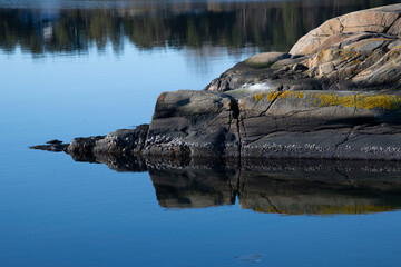 Stone reflected in water