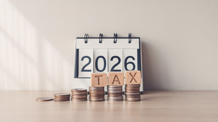 Stacks of Coins with TAX Label and Calendar Year 2026 for Financial Planning