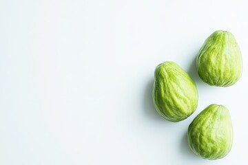 Fototapeta premium New chayote on light backdrop