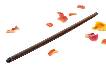 A slender incense stick rests elegantly on a white background surrounded by colorful rose petals isolated on transparent background