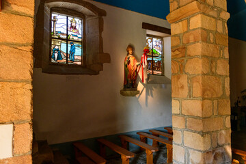 The interior of the chapel of Saint-Cado in Etel in Europe, France, Brittany, Morbihan, Etel, in summer, on a sunny day.