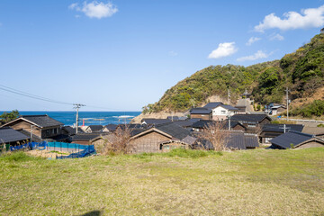 Japanese village by the sea in Asia, Japan, Kansai, Kinosaki, in summer, on a sunny day.
