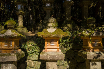 Funerary urns at Kasuga Taisha Shrine in Nara, Asia, Japan, Kansai, Nara, in summer on a sunny day.