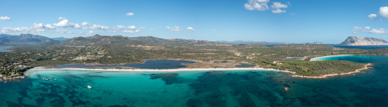 The panorama of the beaches of Capo Coda Cavallo in San Teodoro in Europe, Italy, Sardinia, San Teodoro, in summer, on a sunny day.