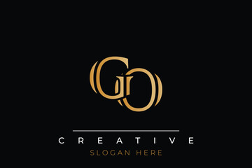 Sophisticated gold GO monogram logo on a sleek black background, ideal for branding, creative design, and luxurious themes.