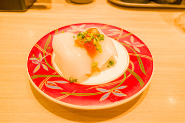 Squid sushi in Osaka in Asia, Japan, Kansai, Osaka, in summer, on a sunny day.