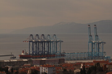 Rijeka, Croatia 17.02.2025. Ship transporting new crain's for Rijeka container terminal. Crain's were deported from China during 70 days of sailing to Rijeka harbour in Europe
