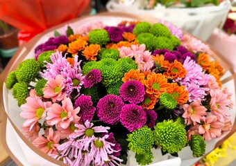 A close-up image of a fresh, colorful bouquet with various flowers, radiating natural beauty and a sense of freshness.