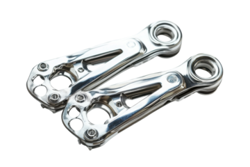 Shiny metal bicycle parts laid out on a clean white surface ready for assembly and repair tasks isolated on transparent background