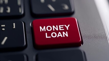 A red button labeled money loan on a keyboard highlights its significance for online financial transactions. This indicates ease of access to loan services from digital platforms.