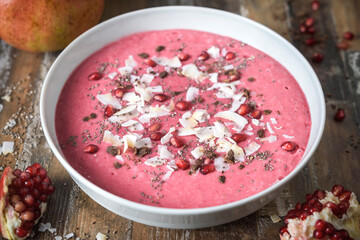 Pomegranate smoothie in the bowl 