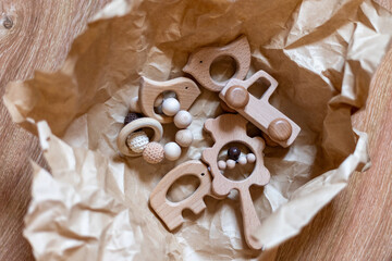 Organic baby teethers on white background. Wooden animal toys set for babies. set of wooden toys