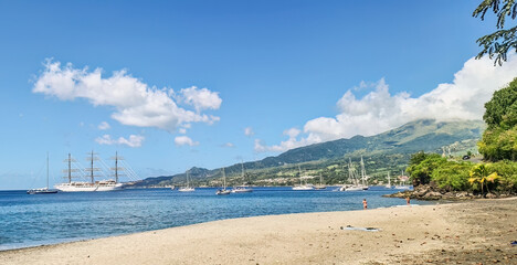 View of the beach and moored yachts in Martinique in the Caribbean Islands, near Saint Pierre