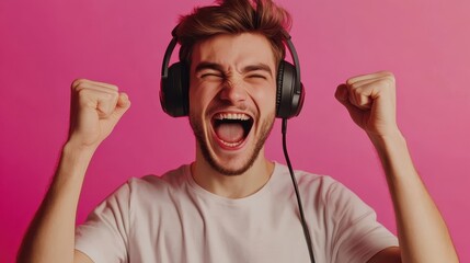Fototapeta premium Joyful Young Man Enjoying Music with Headphones