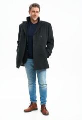 Middle age casual man in coat and jeans. Mid adult, mature age, happy smiling. Full length portrait isolated on white.