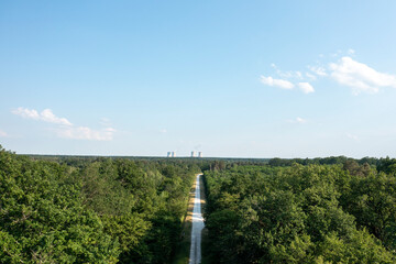 The nuclear power plant seen from the forest in Dampierre-en-Burly in Europe, France, Centre Val de Loire, Loiret, Dampierre en Burly, in summer, on a sunny day.