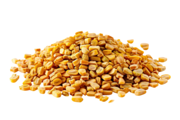 A vibrant mound of golden fenugreek seeds displayed against a clean white background isolated on transparent background