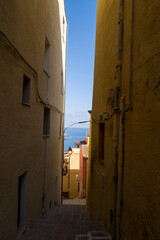 The alleys of the historic city center in Castelsardo in Europe, Italy, Sardinia, Castelsardo, in summer, on a sunny day.