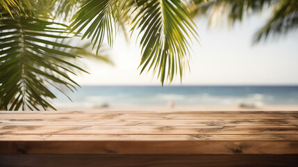 Obraz premium Wooden tabletop overlooking tranquil tropical beach with palm leaves, glistening bokeh sea, and clear summer sky perfect for product display or vacation-themed designs.