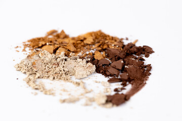 An Array of Natural Powders: Earthy Tones of Various Spices Showcased in a Beautiful Arrangement on a White Background for Culinary Creativity and Inspiration