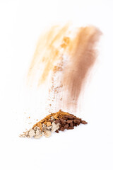 A Colorful Display of Various Spices and Powders Showcased on a Clean White Background Highlighting Natural Textures and Vibrant Hues for Culinary Inspiration and Creativity