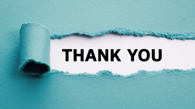Thank you message revealed through a torn blue paper