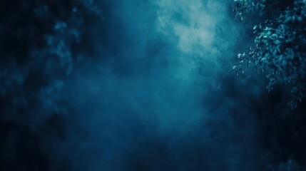 A serene, misty landscape featuring deep blue hues and soft fog engulfing the foliage, creating an enchanting and mysterious atmosphere.
