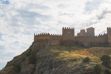 Fototapeta premium Sudak fortress. Crimea - October 09, 2024 - Old Genoese fortress in the city of Sudak in summer. Ancient architecture of Crimea.