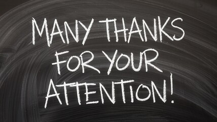 Message written in chalk on a dark chalkboard surface