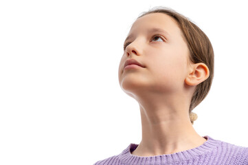 A young girl in a purple sweater gazing upward against a white background.