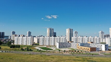 Fototapeta premium New residential area of multi-storey development in Europe with infrastructure (roads, schools, kindergartens, stadiums)