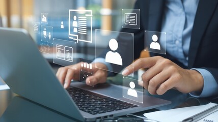 Person interacts with human resource interface on a laptop