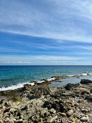 beach and sea with clear blue skies