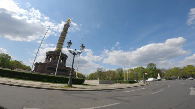 Driving on a roundabout with a view of the Victory Column in Berlin, Germany.