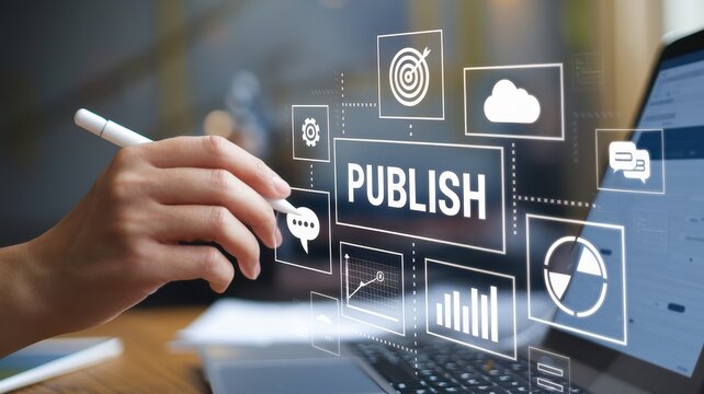 Hand using a stylus pen on a laptop screen to publish