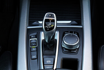 Automatic transmission gearshift stick, Closeup a manual shift of modern car gear shifter. Close up...