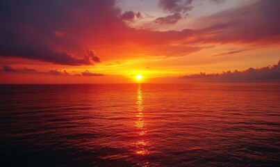 Obraz premium Fiery Sunset over the Ocean