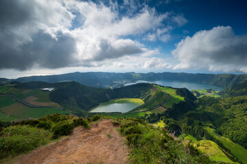 Panoramic landscape from Azores lagoons. The Azores archipelago has volcanic origin and the island of Sao Miguel has many lakes fand is the best travel destination of Portugal.