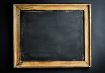 Black chalkboard with wooden frame texture background and empty space.