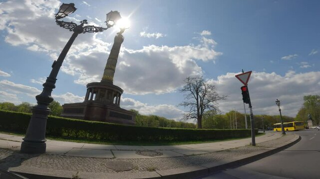 Driving on a roundabout with a view of the Victory Column in Berlin, Germany.