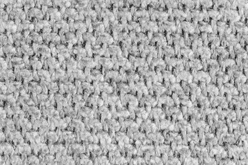 Texture of white jacquard fabric, close up of rough weave macro. Material for home textile, upholstery and curtain decor, garment. Background, wallpaper, backdrop.