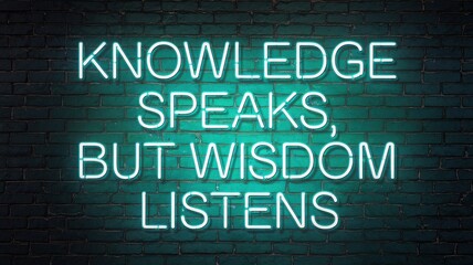 Obraz premium Neon knowledge speaks but wisdom listens sign on brick wall