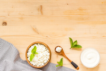 Protein food set with farm dairy products, top view. Milk and cottage cheese with sour cream