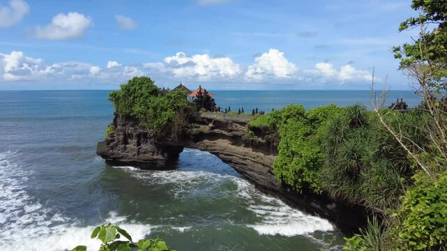 Beautiful rock formation off the Indonesian island of Bali, home to the ancient Hindu pilgrimage temple Pura Tanah Lot.