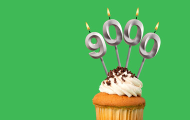 Candle number 9000 - Number of followers or likes.