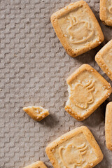 Close up of breakfast biscuits, cookies with sugar on gray background, texture.