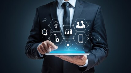 Businessman interacting with digital applications on a tablet device